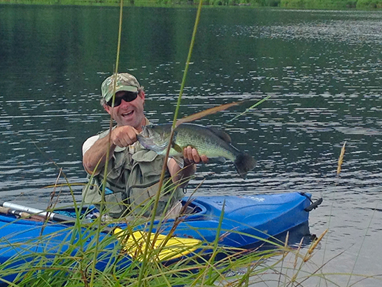 John Mansfield with his catch on Blueberry Lake in Warren.