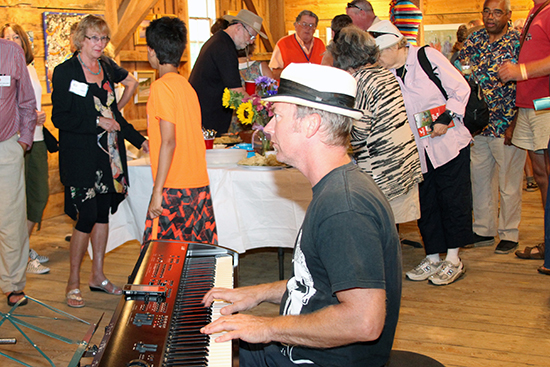 Festivities at the opening of the Big Red Barn Art Show. Photo: Rebecca Silbernagel/VAF