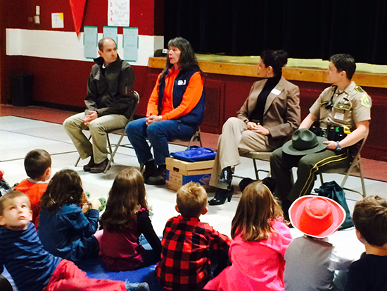 Moretown Elementary School students listen as professional women describe their jobs are part of the schools wellness lesson regarding gender stereotyping. From left to right, Jason Stevenson, school counselor; Ellen St. Marie, snowplow driver; state police detective Tara Thomas and Vermont State Trooper Lindsay O’Steen.