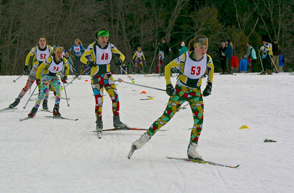 Lacking a full team uniform, the Harwood varsity girls improvise in style. Jordi Kulis (53) leads the group, followed by Kyle Marie Hekeler, Anneka Williams and Isabel Jamieson. Photo: Tara Hamilton