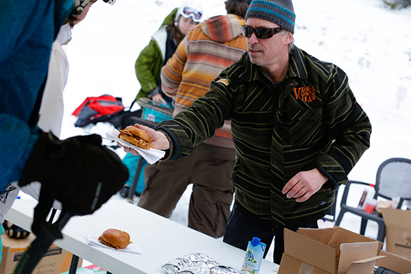 John Morris of the Localfolk Smokehouse hands out sandwiches at the Fat Ski-A-Thon. Photo: Weston Walker John Morris of the Localfolk Smokehouse hands out sandwiches at the Fat Ski-A-Thon. Photo: Weston Walker