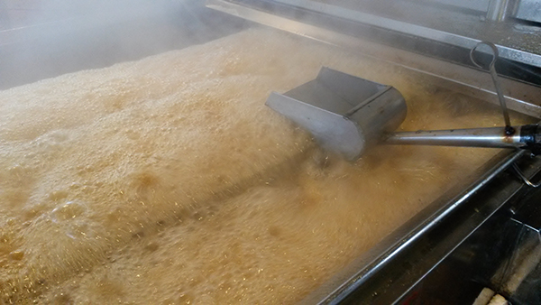 Maple sap being boiled into syrup.