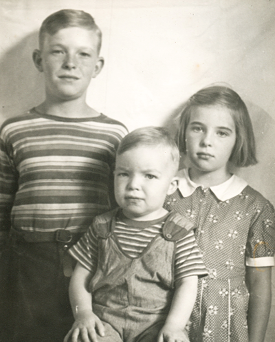 Allen with sister Anne and baby brother Calvin.