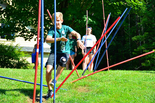 An Eliteam student running dry land slalom.