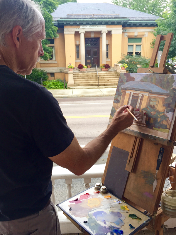 Artist Phil Laughlin painted the Joslin Memorial Library as part of the Plein Air painting event last week. Photo: Rebecca Silbernagel