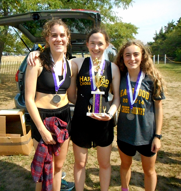 Juniors Isabelle Jamieson, Katie Ferguson and Erin Magill with their second-place trophy. Photo: Stephen Magill