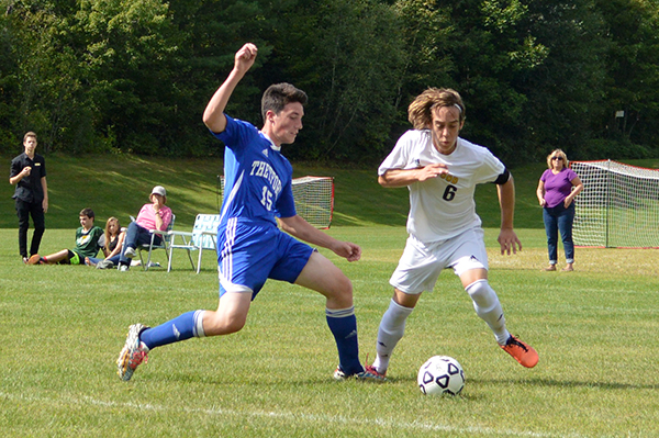 No. 6 Cyrus Zschau fights for possession during the second half of Saturday’s home game against Thetford. Photo: Chris Keating