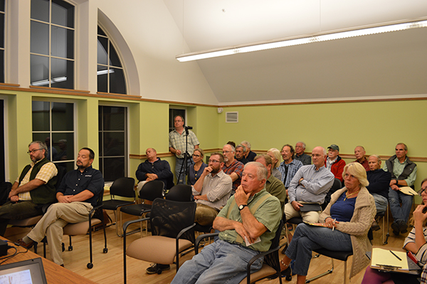 Waitsfield residents listen to plans to develop a park next to the covered bridge. Photo: Chris Keating