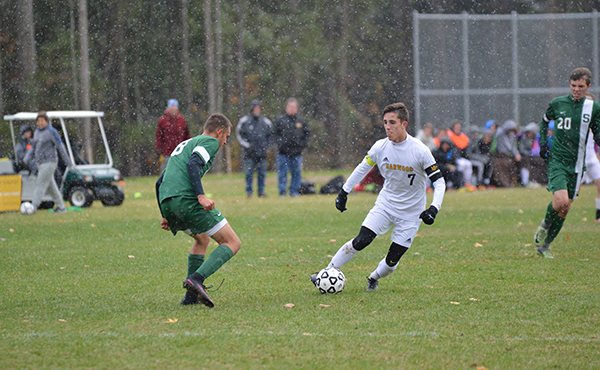 Harwood's Ethan Riddell works past a Springfield defender during Harwood's 10-1 playoff win. Photo: Chris Keating