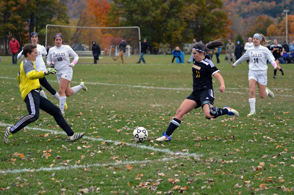 Harwood’s Posey Labombard takes a shot en route to the Highlanders’ 3-1 win against Mt. Abe in playdown action. Photo: Chris Keating