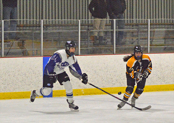 Harwood forward Keara Hallam maneuvers around a U-32 defender en route to scoring. Harwood lost the game 9-3. Photo: Chris Keating 