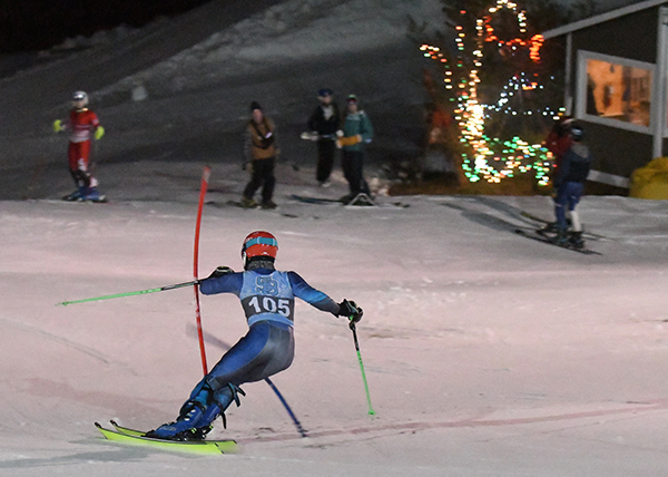 Harwood's Austin Taylor racing under the lights at Cochran's Ski Area in Richmond, VT, January 23. Taylor was No. 1 for Harwood and No. 1 overall winning first and second run. Rex Rubenstein was No. 2 for Harwood and No. 4 overall. Piper Beike was the top girl for Harwood in 10th overall and Bo Rubenstein was second for Harwood and 16th overall. Photo: John Williams