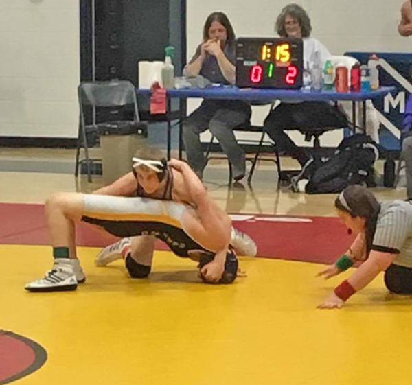 Harwood sophomore Cooper Farnham, bottom wrestler. Photo: David Howes