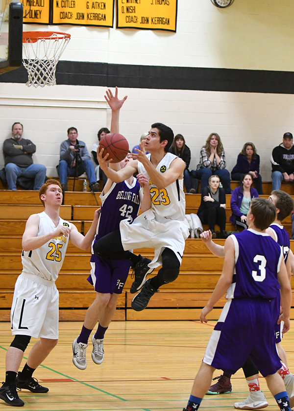 Harwood Captain Shiv Seethepalli lays up in Tuesday nights win over Bellows Falls. Photo: John Williams