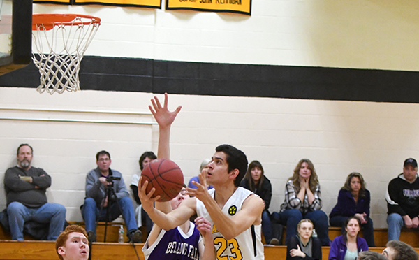 Harwood Captain Shiv Seethepalli lays up in Tuesday nights win over Bellows Falls. Photo: John Williams