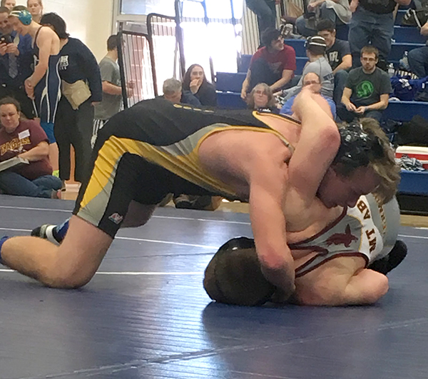 Freshman Sully O’Hara goes for the fifth-place win against a Mount Abe wrestler at the state championships last weekend. Photo: Morgan Howes.
