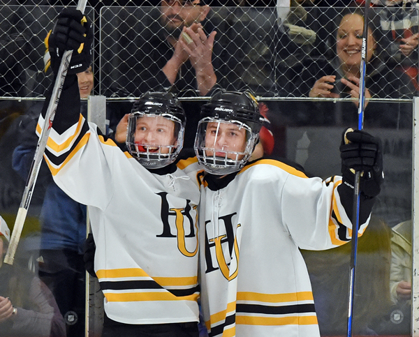 Eli Rivers and Ryan Garrand celebrate after scoring in their win over Bur & Burton on their way to the state championships. Photo: Gordon Miller