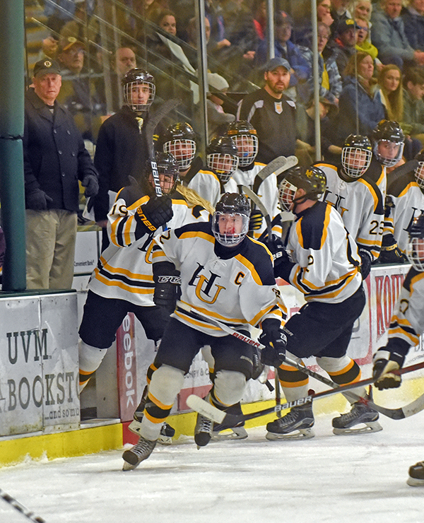 Eli Rivers leads the line change for Harwood during Vermont’s Division II state championship game against North Country Union. Photo: Gordon Miller