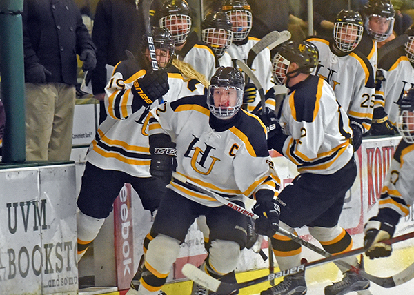 Eli Rivers leads the line change for Harwood during Vermont’s Division II state championship game against North Country Union. Photo: Gordon Miller