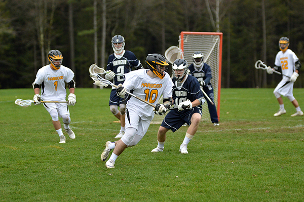 Harwood and Burlington players face off in Harwood's 7-9 loss. Photo: Chris Keating