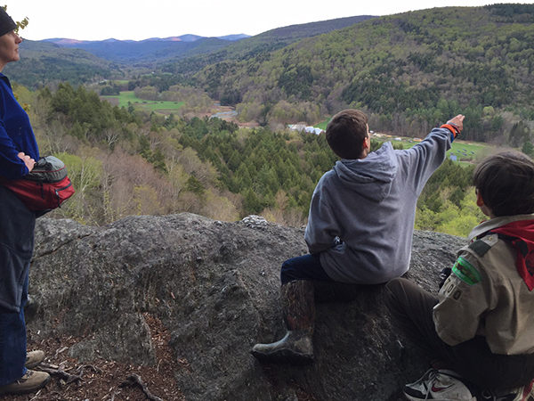 Scouts look out at the Mad River Valley from the Wu Ledges in Waitsfield. Photo: AnnMarie Harmon