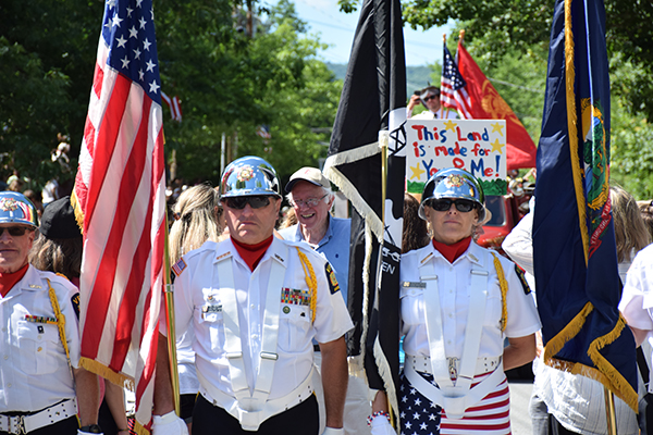 The VFW Color Guard heading up the annual Warren Fourth of July Parade with special guest Vermont Senator Bernie Sanders. Photo: Jeff Knight