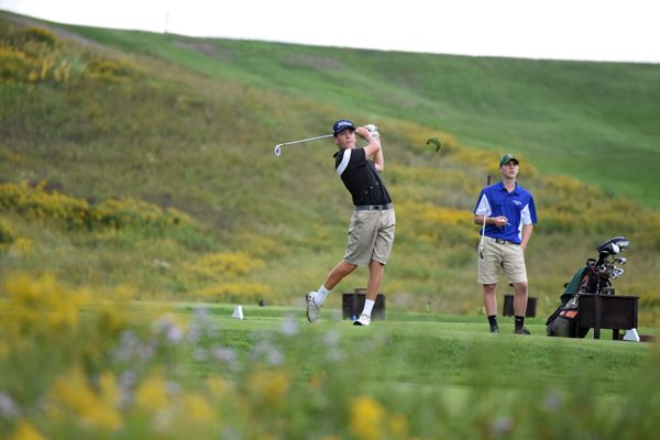 Harwood's Ian Groom tees off during the Highlander win on Thursday, September 7 at the Country Club of Vermont. Photo: Chris Keating