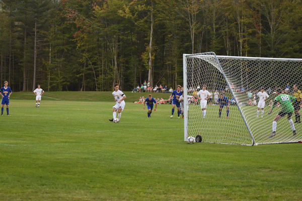Wyatt Adams takes a penalty kick during Harwood's victory over Lamoille. Photo: Christopher Keating Wyatt Adams PJ