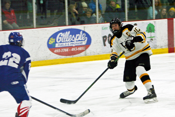 Harwood's Colin Green fires a shot in the Highlander's 3-2 loss on December 13 game against Missisquoi Valley Union. Photo: Christopher Keating