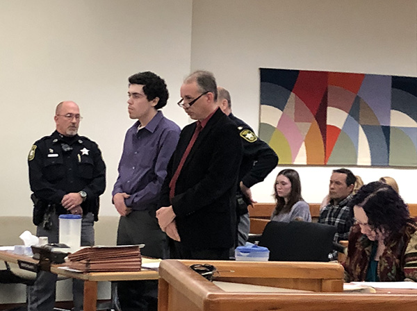 Andrew Baird IV with his attorney at his sentencing hearing on December 19, 2017.