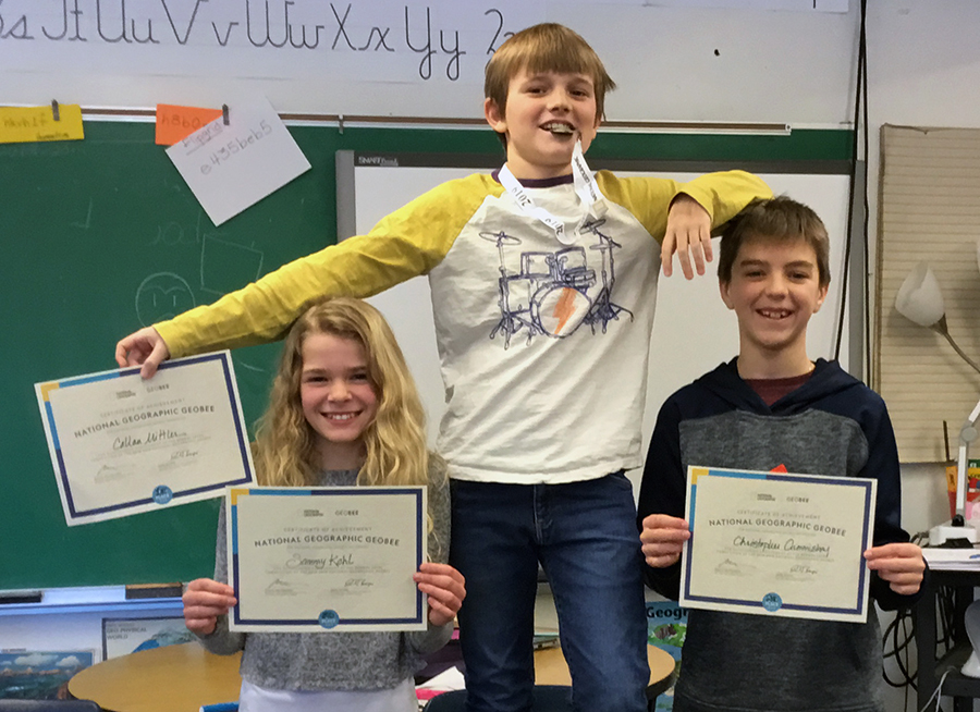 Warren School winners: Callan Mittler (champion), second-place Christopher Cummiskey, third-place Samantha Kohl. Warren School GeoBee winners