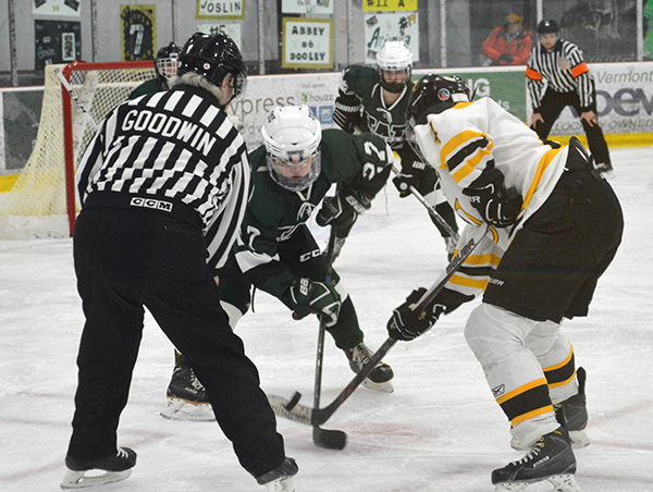 Harwood’s April Tousignant faces off against a Woodstock player in quarterfinal play.