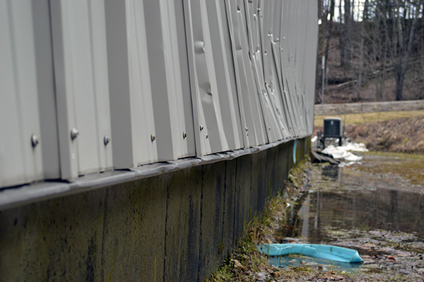 Duxbury VT Town garage back wall damage