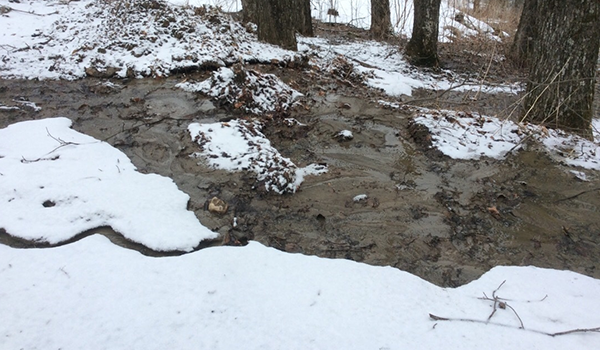 Snowmelt and spring rain cause erosion and wash sediment downhill. Photo: Ira Shadis.