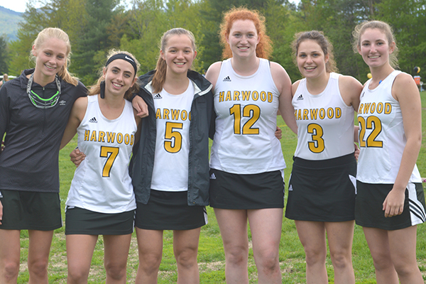 Photo: Katie Martin. Harwood girls’ lacrosse played GMVS  for their senior game on May 24. From  left to right: Kayla O’Toole, Dana Marchitelli, Zoe Buffum, Johanna Jarecki, Samantha Widschwenter, Kelly Tynan, Erica Dow, Francie Aiken and head coach Hillary Wheeler.