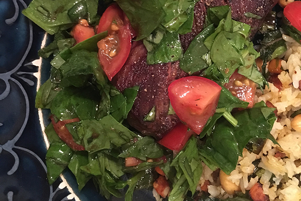 Steak with tomatoes and basil