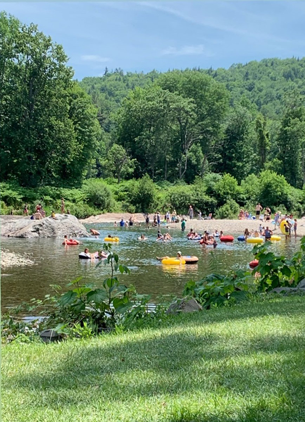 Holiday week enjoyment of the Mad River in Waitsfield.