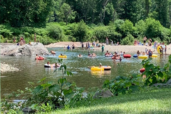 Holiday week enjoyment of the Mad River in Waitsfield.