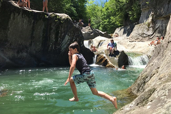 Photo: Brad Long. Swim holes throughout the Mad River Valley have been extremely busy this summer.