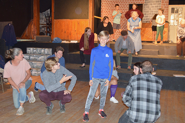 Tarin Askew (one of two playing the title role in “Oliver!”) rehearses a dance number with the cast.