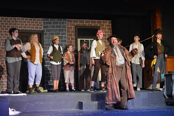Photo: Katie Martin. The band of pickpockets with their leader Fagin.