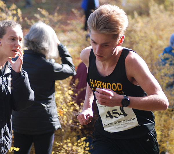 Carlton CummiskeyPhoto: Laura Caffry. Carlton Cummiskey finished eighth for the boys at the state meet and qualified for the New Englands