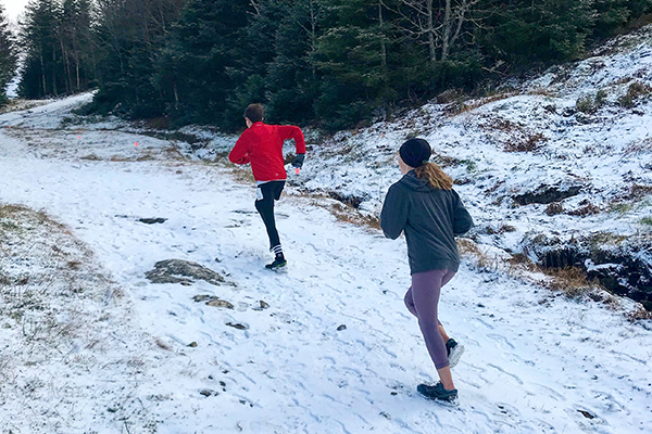 Rye MacCurtain, in red. and Jill Rundle head up to the slope at Mad River Glen during Harwood's Inaugural Highlander Sky Vertical.