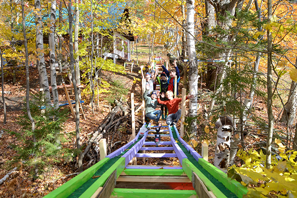 Photo: Eddie Merma. Over 50 local youth created a multitude of hand-built games, rides, prizes and a 200-foot-long roller coaster at Knoll Farm.