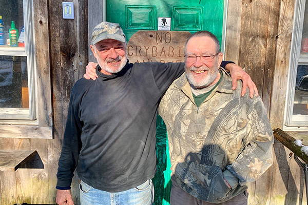 Photo: Hadley Laskowski. From left to right: John Dezotelle, a deer camp regular, and Mike Mackenzie, one of the original founders of the camp on North Fayston Road.