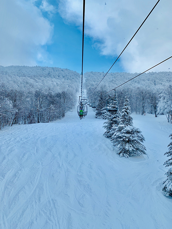 Happy crowds tackle 12 inches of powder