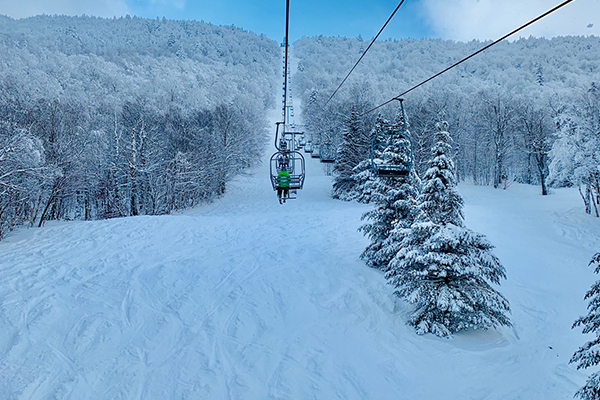 Happy crowds tackle 12 inches of powder
