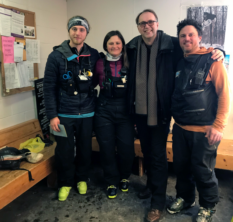 Sugarbush ski patrollers Andreas Panos, Allie Burhans and Leo Crain flank Martin, second from right, on February 15 when he  returned to Mt. Ellen to thank them for saving his life. Photo: Chad Borofsky.