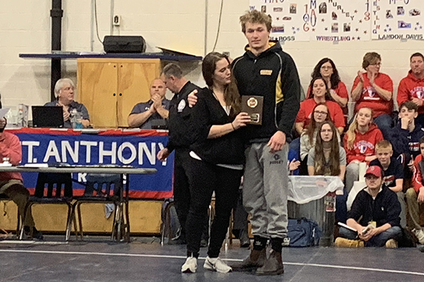 Harwood’s Sully O’Hara, right, placed third in the Vermont High School Wrestling State Championships. He is shown here with his coach, Casey Moulton.