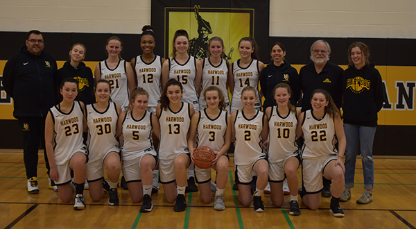 k row (L to R): coach Tommy Young, Maya Pierson (manager), Ellie Odefey, Ella Gannon, Mia Cooper, Sarah Bartolomei, Ashlyn Carst, coach Melody Frank, coach Greg Titus, Kate McCracken (manager). Front row (L to R): Jaye Fuller, Emilee Semprebon, Morgan Longe, Ashley Proteau, Emma Ravelin, Kennedy Wimble, Tanum Nelson and Alivia Powers